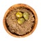 Tapenade - olive paste made from green olives. Spreadable green olive cream in wooden bowl isolated on white. Top view