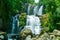 The tapering Nauyaca Waterfalls in Costa rica, a majestic cascading fall in Dominical province, Costa Rica