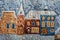 Tapestry fragment winter city landscape houses under  snow close-up background