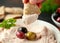 Taramasalata dip with pita bread and olives