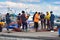 Taranto, Apulia - Italy / 02/19/2019 : Fishermen trying to solve the broken nets mystery of Taranto south Italy