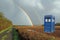 Tardis lands in meadow with rainbow