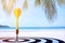 Target dart with arrow over summer background ,image for target marketing holiday vacation concept