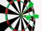 Target with three green dart focus on bull`s eye, Setting challenging business goals And ready to achieve the goal with teamwork