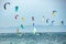 TARIFA, SPAINE - July 19, 2018: Many kitesurfers and windsurfers doing sports in the Atlantic ocean