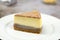 Taro cheese cake on wooden board