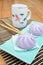 Taro Mantou Chinese steamed bun in green dish on bamboo mat