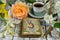 Tarot card Joker with rose and lily flowers on witch altar, fortune telling seance