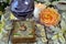 Tarot cards deck, crystal ball, runes and flowers on witch table