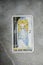 Tarot. II, 2, two. High Priestess. Esoteric tarot cards for divination on a gray marble background