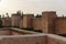 Taroudant old medieval defensive wall and palms alley, Morocco