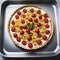 Tart with cherry tomatoes, cheese and onions on aluminum baking dish. From series Healthy Eating