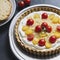 Tart with cherry tomatoes, cheese and onions on aluminum baking dish. From series Healthy Eating
