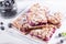 Tart, pie, cake with jellied strawberry, bilberries on white background. Homemade pie for tea time