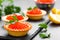 Tartalets with red salmon fish caviar, salmon caviar. Caviar