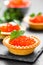 Tartalets with red salmon fish caviar, salmon caviar. Caviar