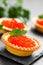 Tartalets with red salmon fish caviar, salmon caviar. Caviar