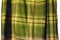 Tartan kilt by Mairi Macintyre of Scotland in green, cream, ochre