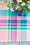 Tartan square pattern with blooming lobelia flowers