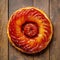 Tarte tatin, upside down apple tart, traditional french apple pie with caramelized apples on wooden background, top view. Created
