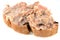 Tartine of pork rillettes on a white background