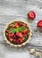 Tartlet with chocolate cream, strawberries and pistachios