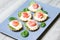 Tartlet with cream cheese, cucumber and slightly salted trout