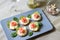 Tartlet with cream cheese, cucumber and slightly salted trout