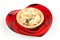 Tartlet with salad on a red plate