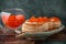 Tartlets or canapes with butter and red caviar. Gourmet food, appetizer. Delicatessen.