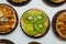 Tartlets with caramel and nuts. Delicious appetizing tarts with kiwi on a white background