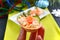 Tartlets with cream cheese and red salted salmon on a white plate for the festive table. Tasty portion light snack for a party.