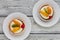 Tartlets with cream and fruits, orange, kiwi, cherry