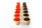 Tartlets filled with red and black caviar against rustic wooden background