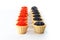 Tartlets filled with red and black caviar against rustic wooden background