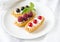 Tartlets with fresh berries and whipped cream