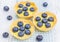 Tartlets with lemon curd and blueberries