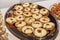 Tartlets with red caviar on a dish on the buffet table. Festive table setting at events. Close-up