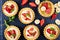 Tartlets with strawberries, banana slices, mint