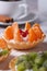 Tartlets with tangerine, cranberry and coffee