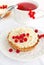 Tartlets with whipped cream and red currants