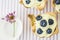 Tarts with blueberries on striped tablecloth