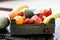 Tasteful fruit organic fruits in a wooden crate