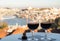 Tasting of different fortified dessert ruby, tawny port wines in glasses with view on Douro river, porto lodges of Vila Nova de