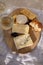 Tasting and pairing of cold white wine with different cheeses in sunny Provence, France