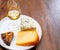 Tasting and pairing of different cheeses with strong alcoholic drinks, whisky, cognac or calvados