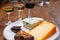 Tasting and pairing of different cheeses with strong alcoholic drinks, whisky, cognac or calvados