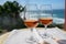 Tasting of sweet moscatel de setubal or porto portuguese wine and view on blue Atlantic ocean near Sintra in Lisbon area, Portugal