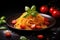 Tasty appetizing classic italian pasta on dark table