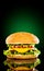 Tasty and appetizing hamburger on a darkly green